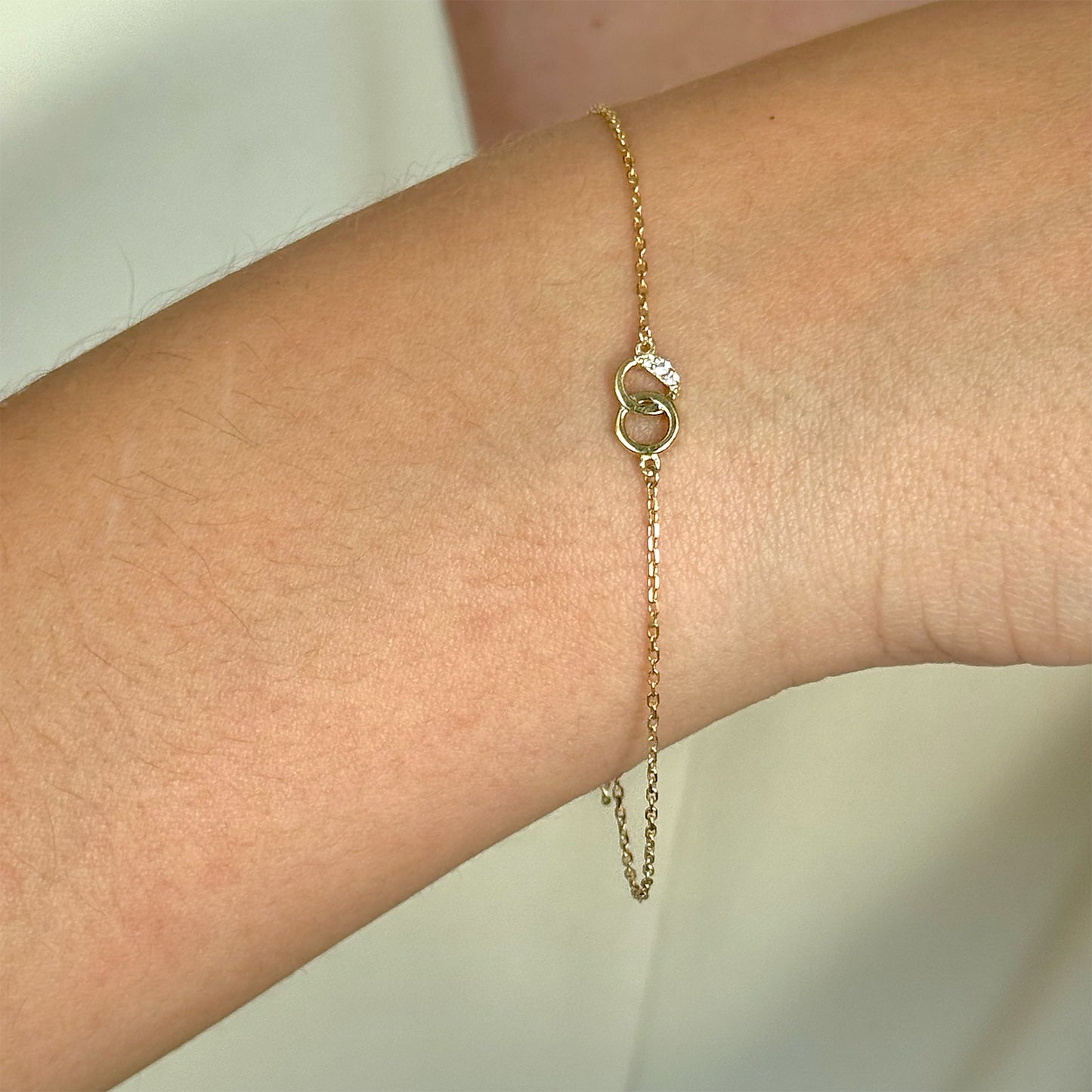 JUEGO AJUSTABLE CADENA Y PULSERA ORO 14 KILATES 2 AROS ENLAZADOS